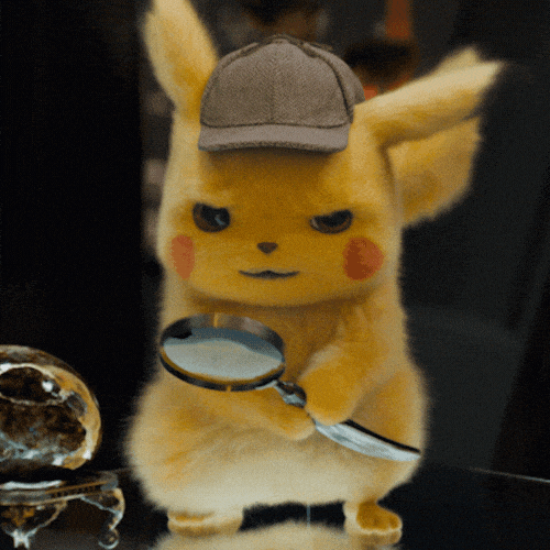 Detective Pikachu inspecting through a magnifying glass